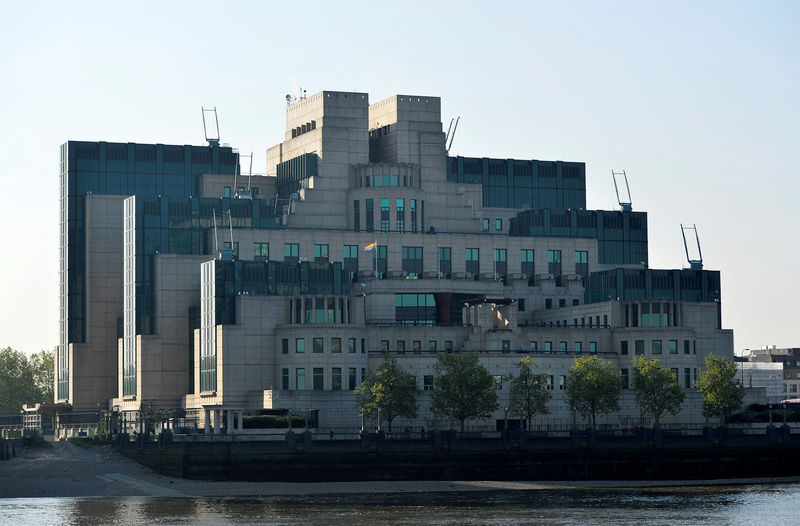 FILE PHOTO: The MI6 Vauxhall Cross building raises the Rainbow Flag to mark its support for the International Day Against Homophobia, Transphobia and Biphobia in London